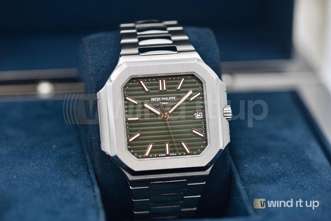 Patek Philippe Cubitus 5821/1A-001 — green sunburst with horizontal embossed pattern dial, stainless steel, 2025